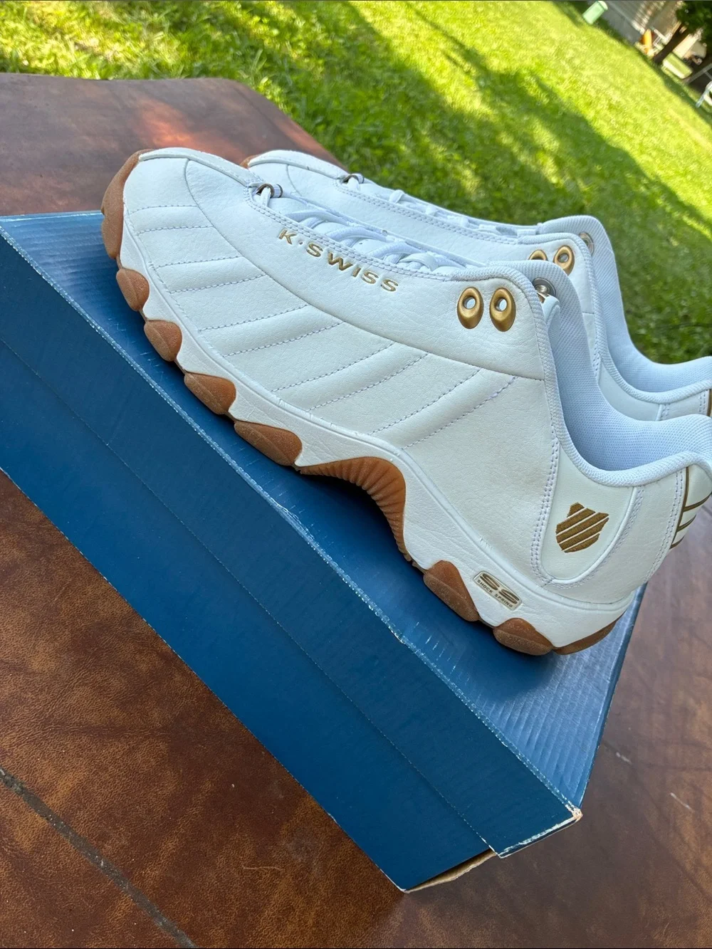 K-Swiss White and Tan Athletic Sneakers